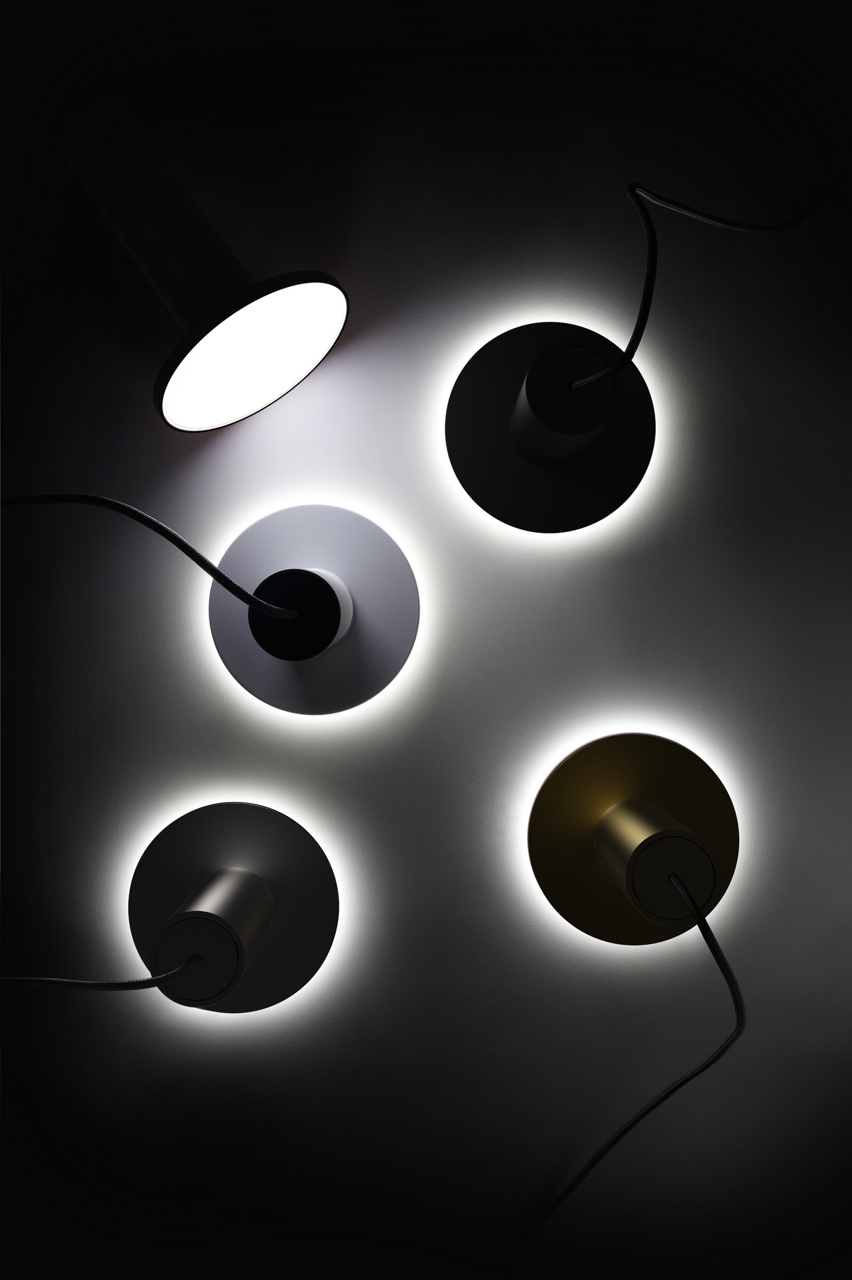 Cielo Plus LED chandelier above a lounge seating group