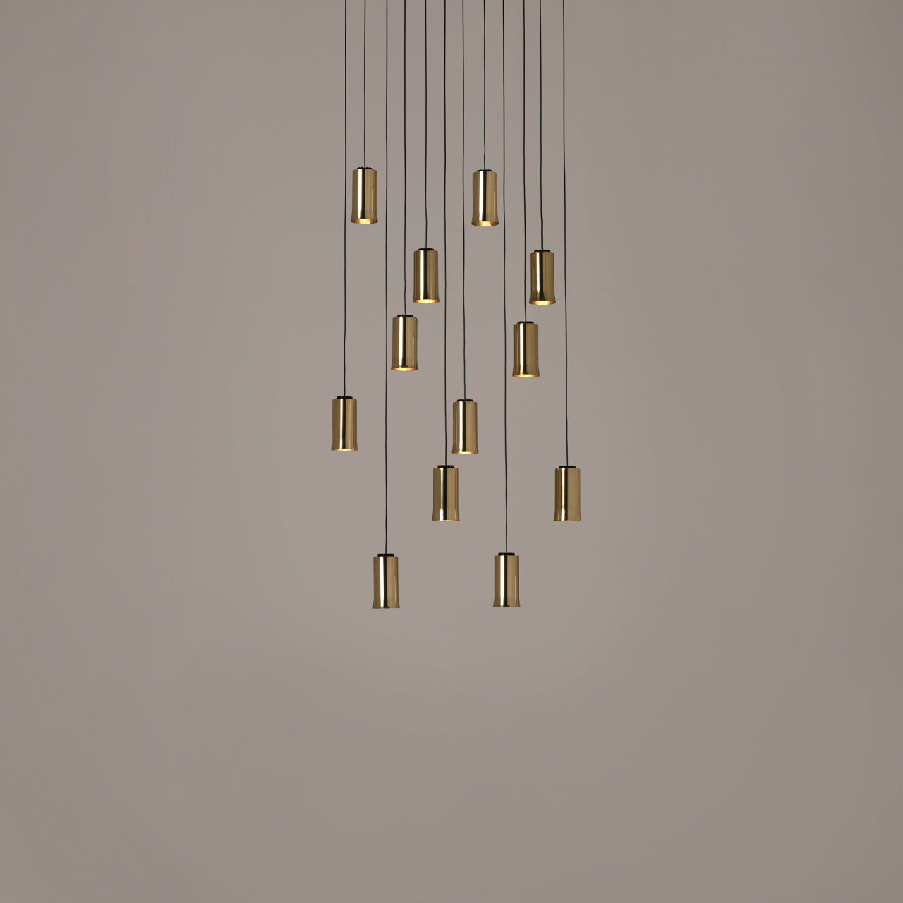 Modern Cirio Cascada multi-pendant LED fixture by Santa & Cole Spain with cascading lights for dining rooms in polished brass