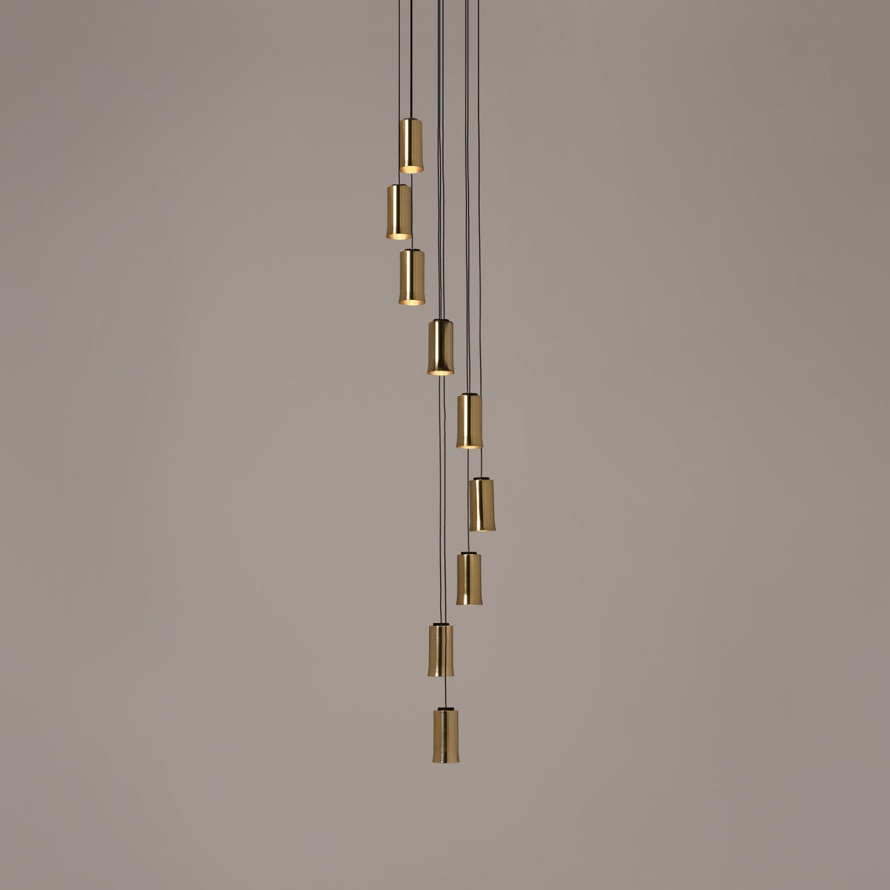 Modern Cirio Cascada multi-pendant LED light by Santa & Cole Spain for hotel lobbies and dining rooms in polished brass