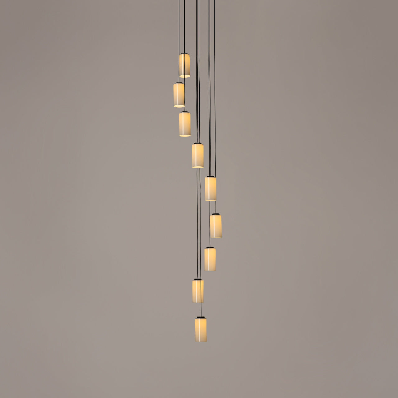 Cirio Cascada 9-light hanging LED fixture designed by Antoni Arola with opal glass shades for modern interiors