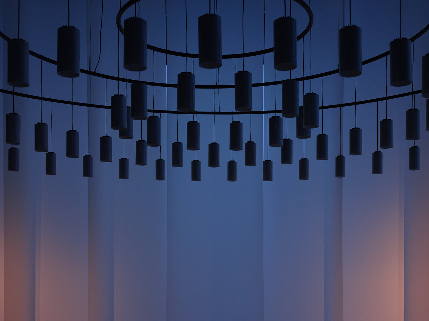 Warm white architectural pendant lighting for modern commercial spaces