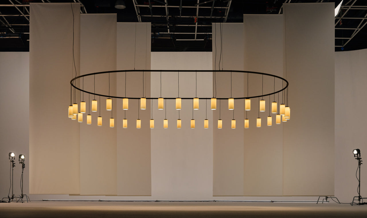 Santa & Cole designer pendant light with oval chandelier form