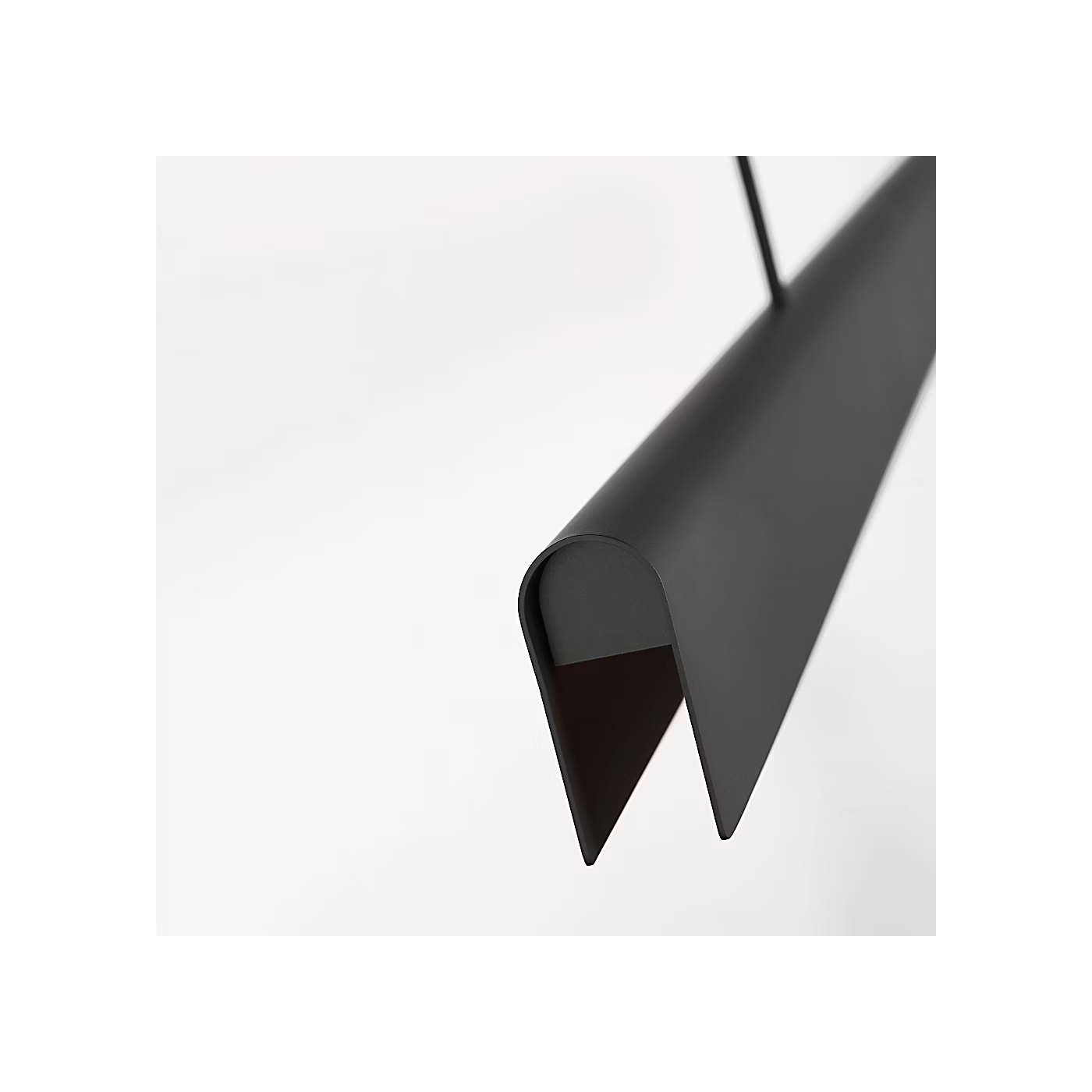 Architectural linear pendant light in Nightshade Black for modern living spaces