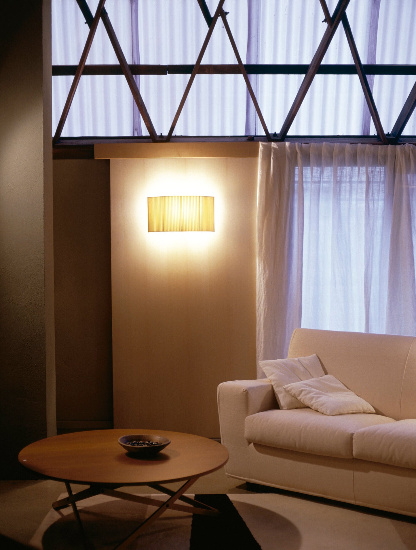 Designer Spanish wall lamp in Natural Ribbon finish for modern residential and hospitality interiors