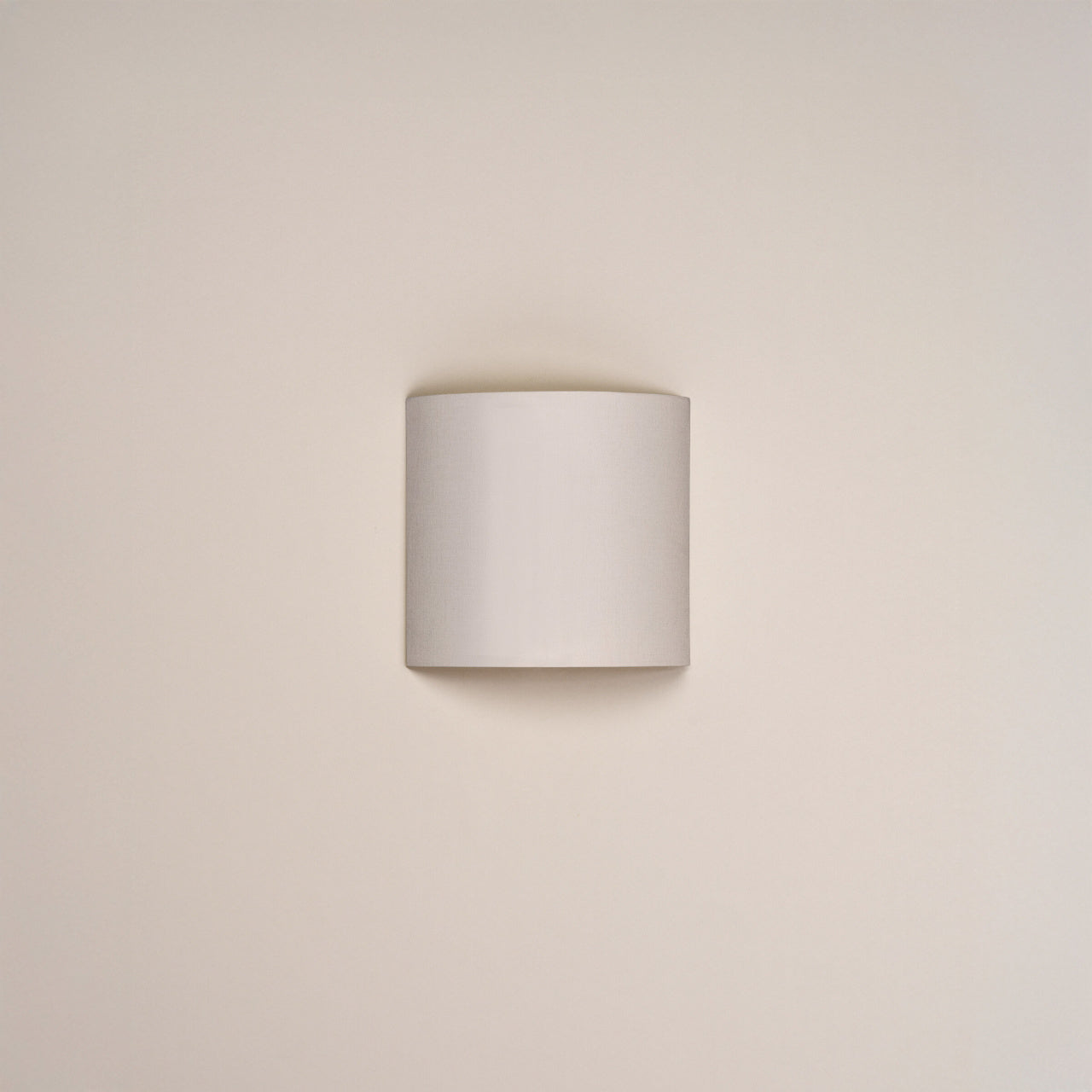 Santa and Cole Comodin White Linen wall lamp with soft indirect LED illumination