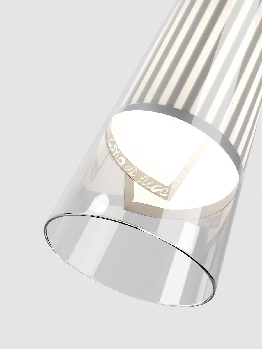 Lodes Cono di Luce hanging light featuring a sculptural clear glass cone and warm LED