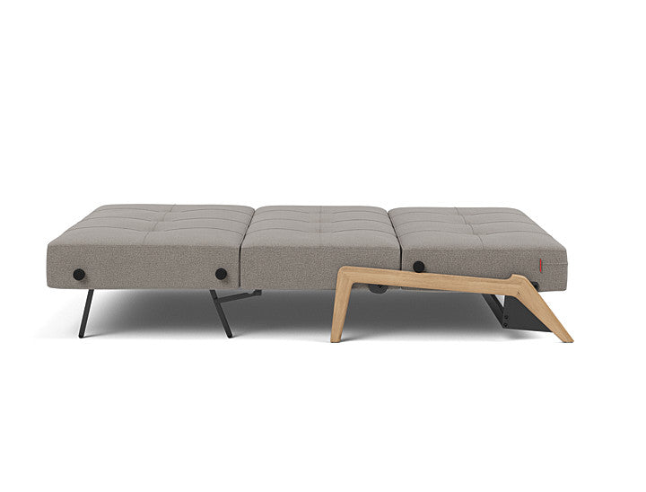 Innovation Living Cubed sofa bed showing integrated bedding storage compartment