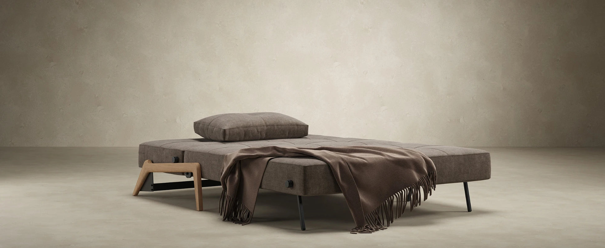 Innovation Living sofa bed with built-in storage compartment