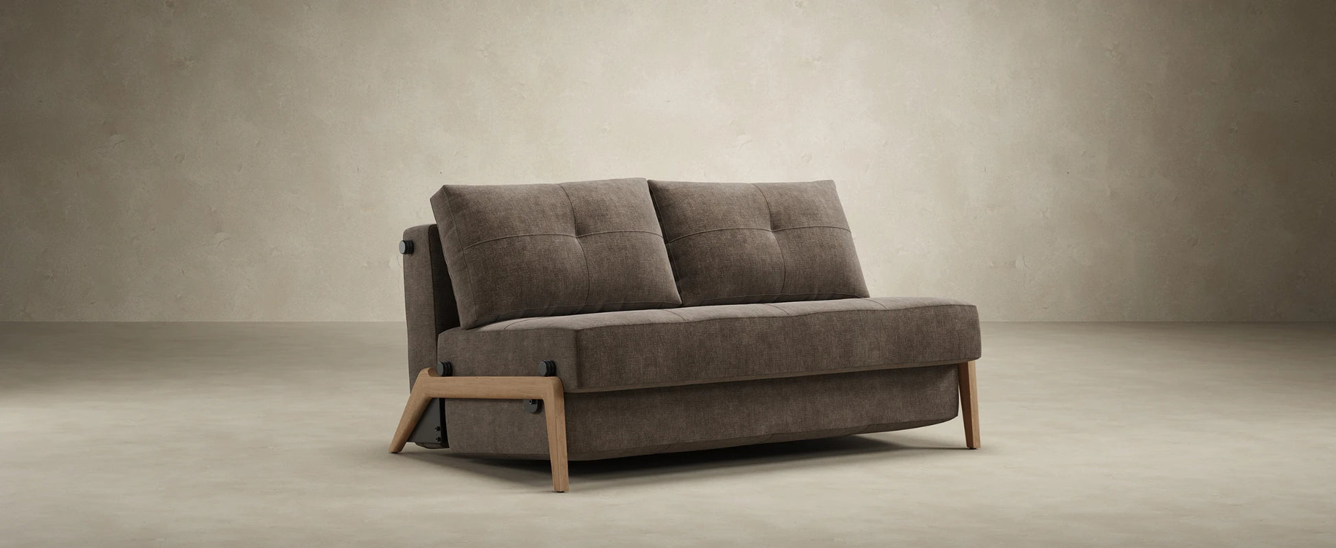 Cubed sofa shown as a comfortable full size bed