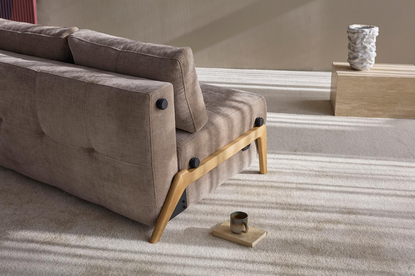 Compact convertible sofa for small living spaces