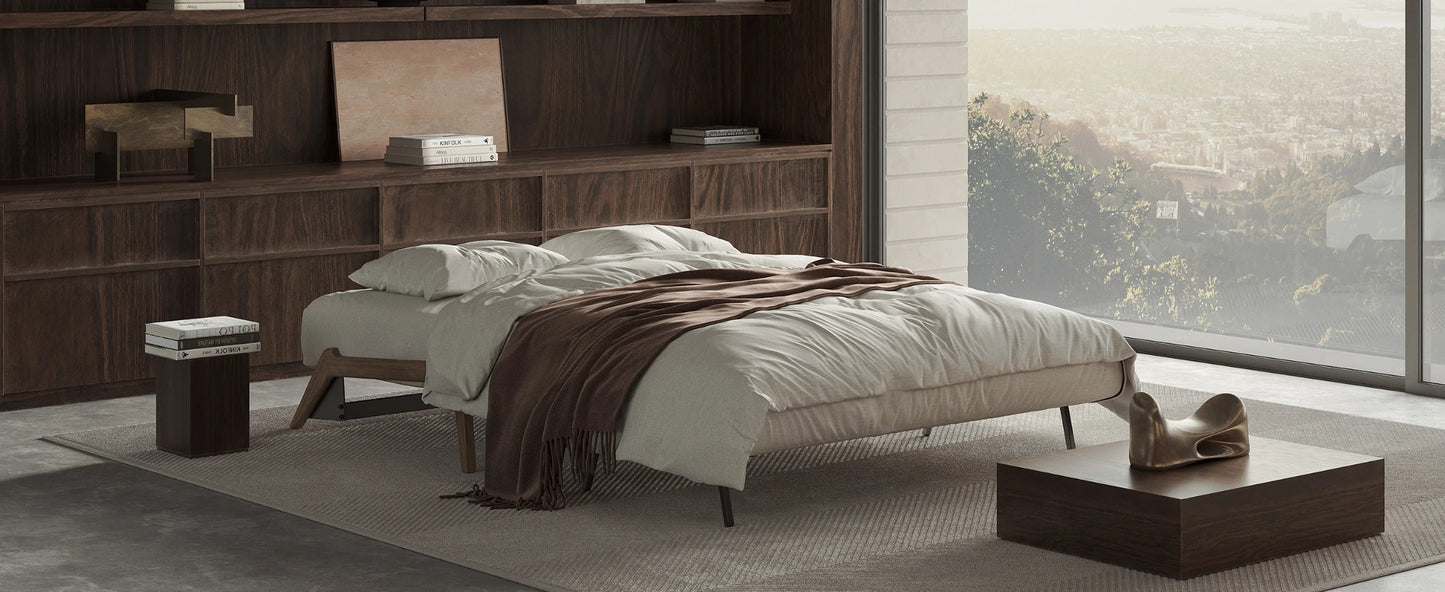 Compact queen sleeper sofa with built-in bedding storage for modern homes