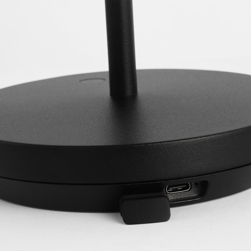 Contemporary black table lamp with integrated LED lighting and touch dimmer control