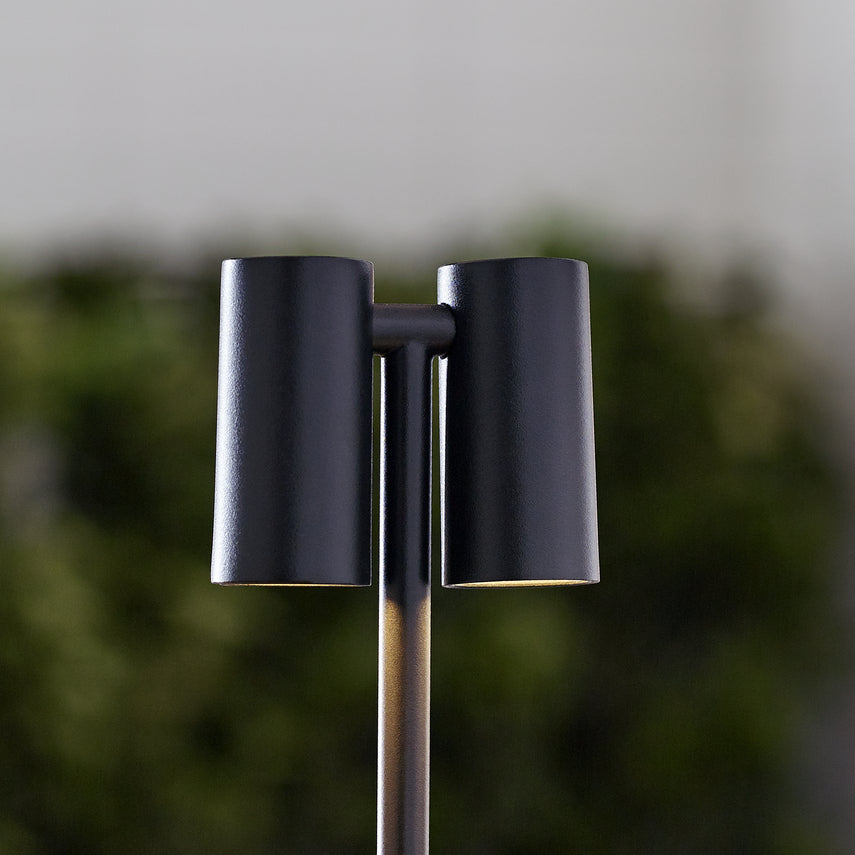 Modern black bedside lamp with rechargeable battery and warm white illumination