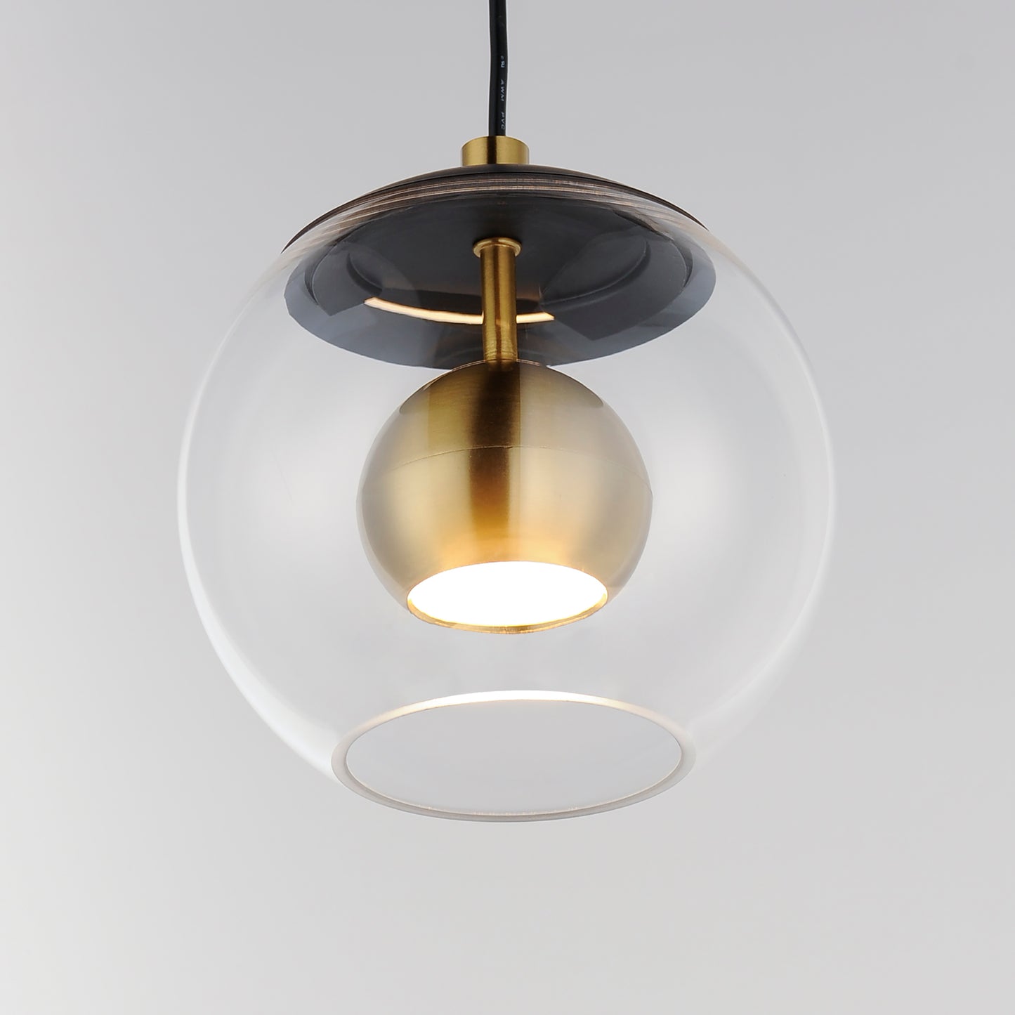 Nucleus 7" LED Pendant Black/Natural Aged Brass by ET2