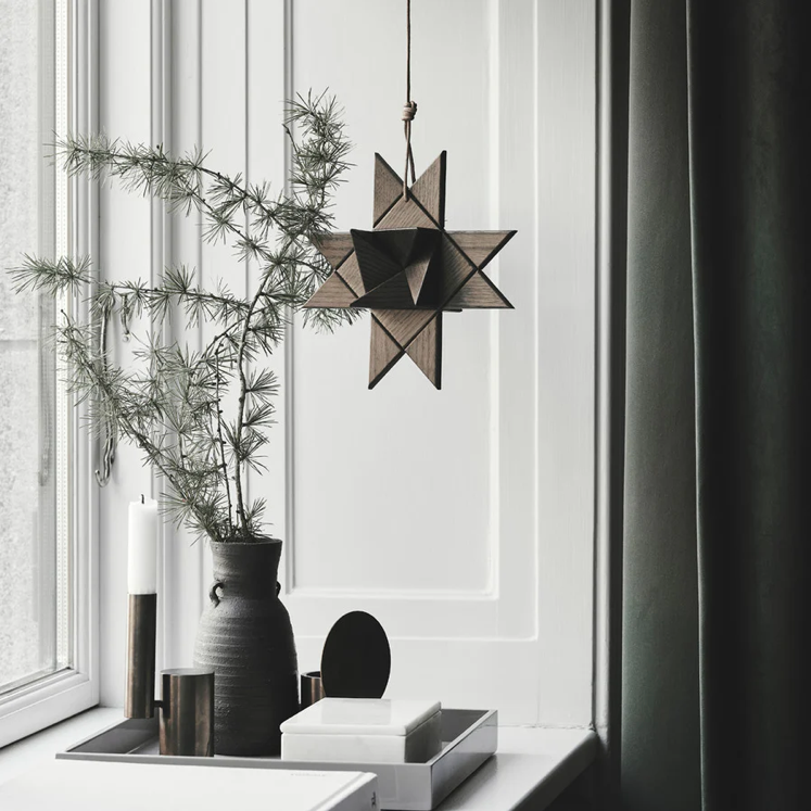 Boyhood Fröbel Star, Hanging wooden star in smoked oak, view 2 (image 1)