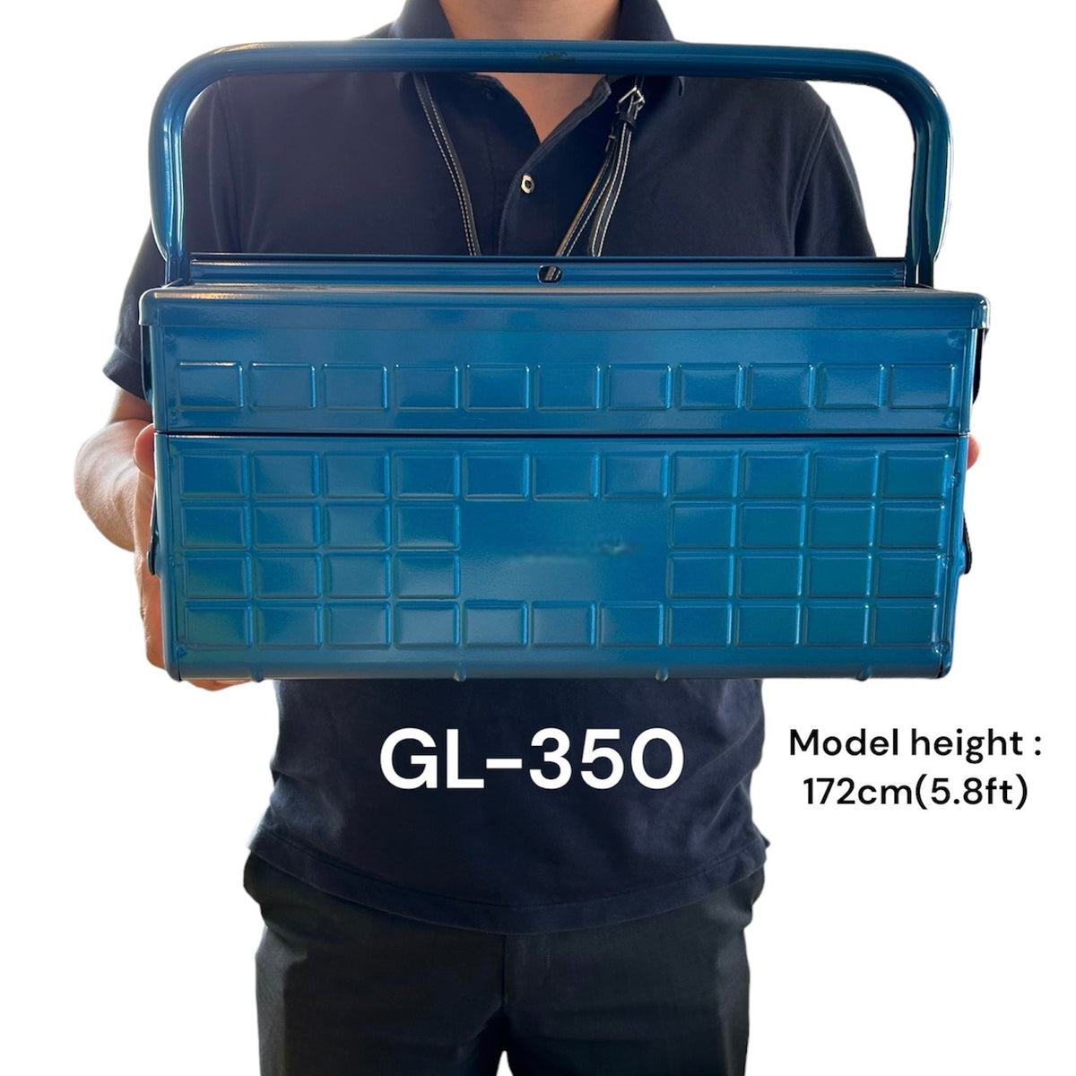 Toyo Steel GL-350 Three-Level Cantilever Toolbox, Blue – held by its handle, showing its size