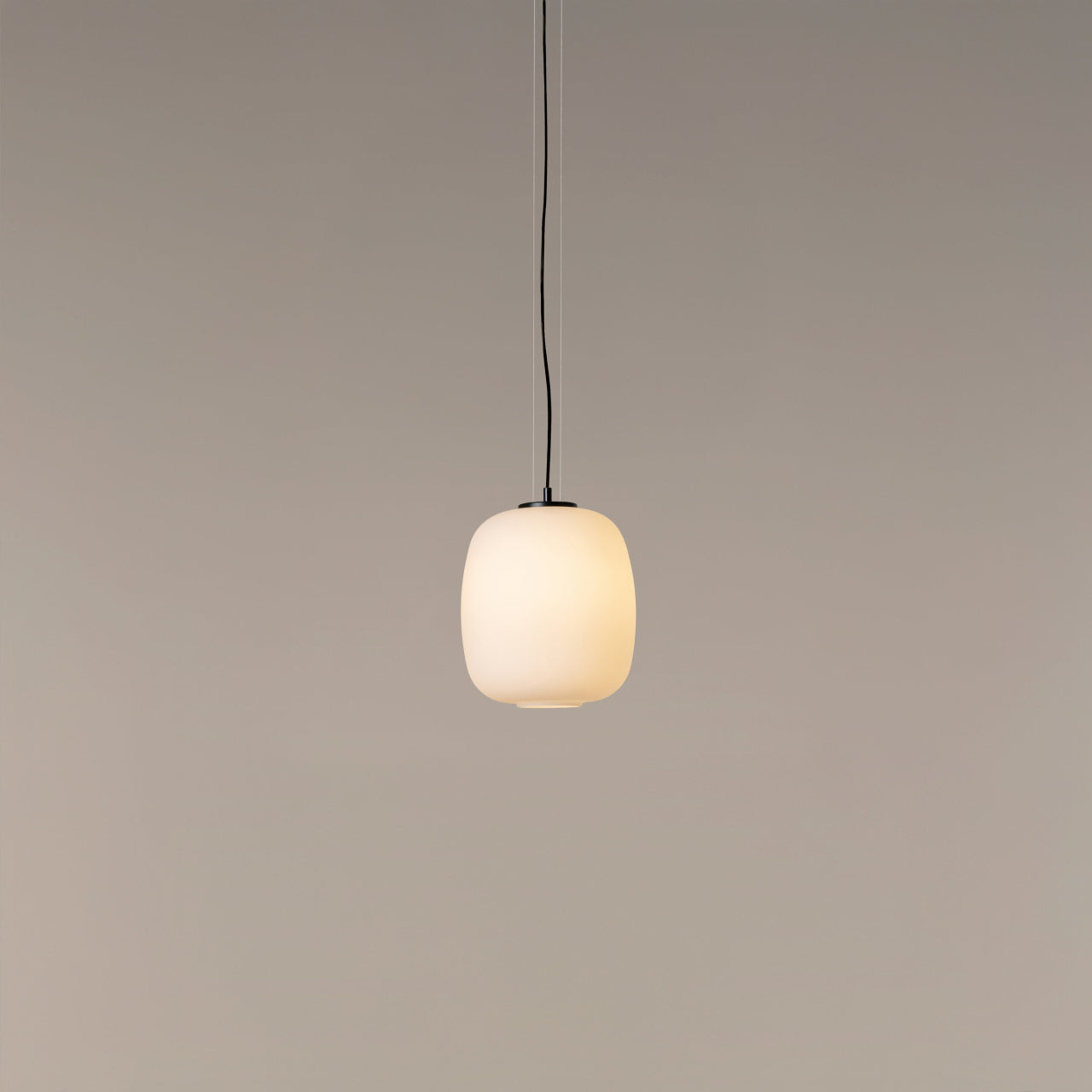 Santa & Cole pendant light in boutique hotel lobby interior design
