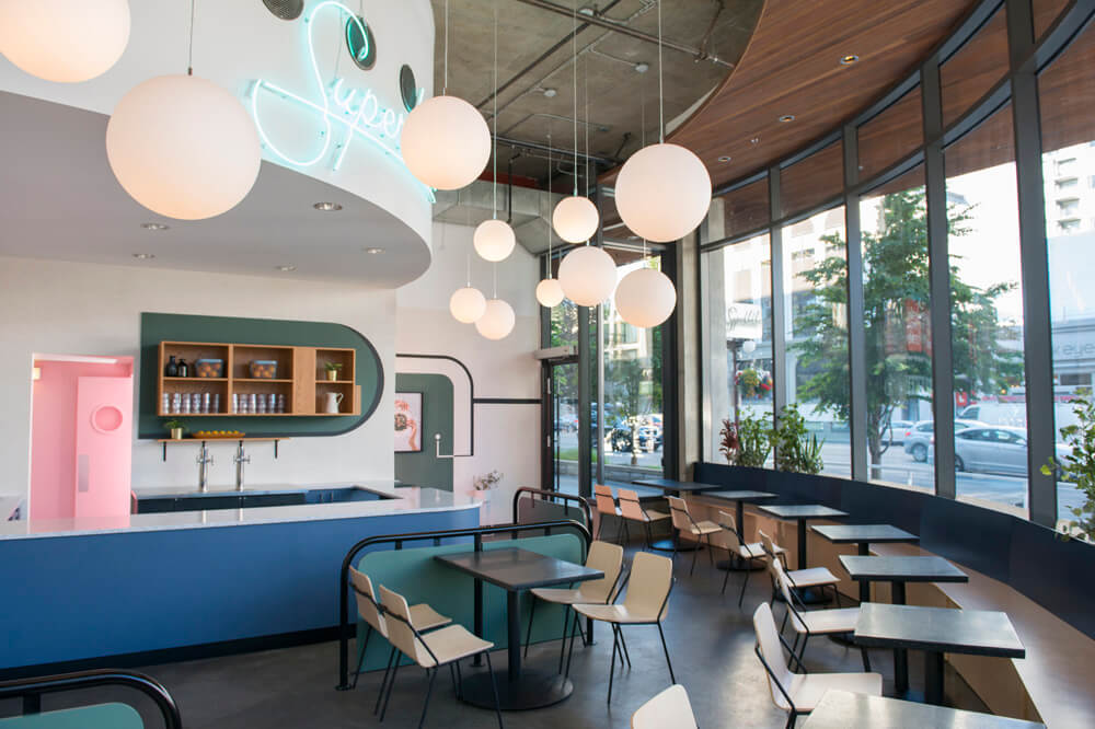 Globo frosted pendant light by Viso in a lifestyle setting, view 1