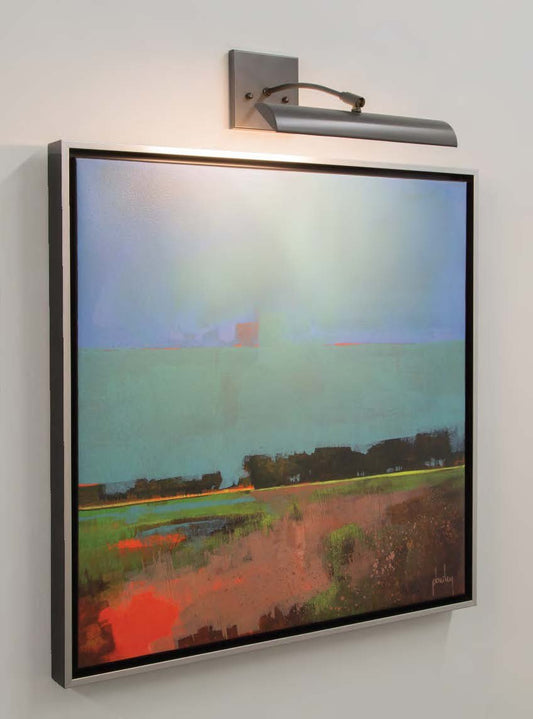 House of Troy Zenith 12" Direct Wire LED Picture Light in Oil Rubbed Bronze in a room setting
