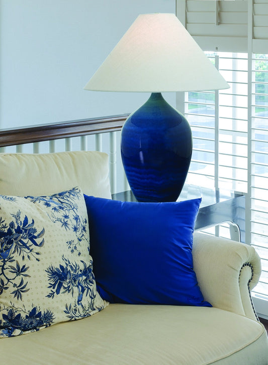 House of Troy Scatchard 27" Stoneware Table Lamp, Style GS190 in Blue Gloss in a room setting