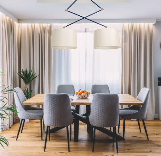 House of Troy Uptown Double Adjustable Pendant in a room setting