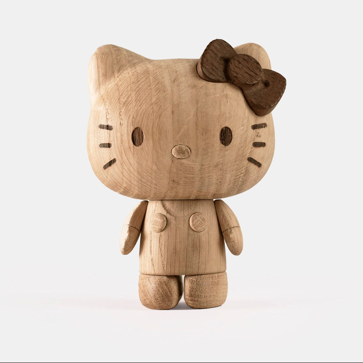 Boyhood Hello Kitty wooden figure in oak, Small (image 1)