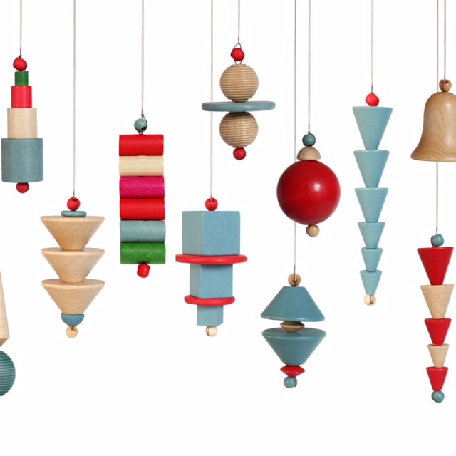 Bauhaus Christmas ornaments hanging in a row