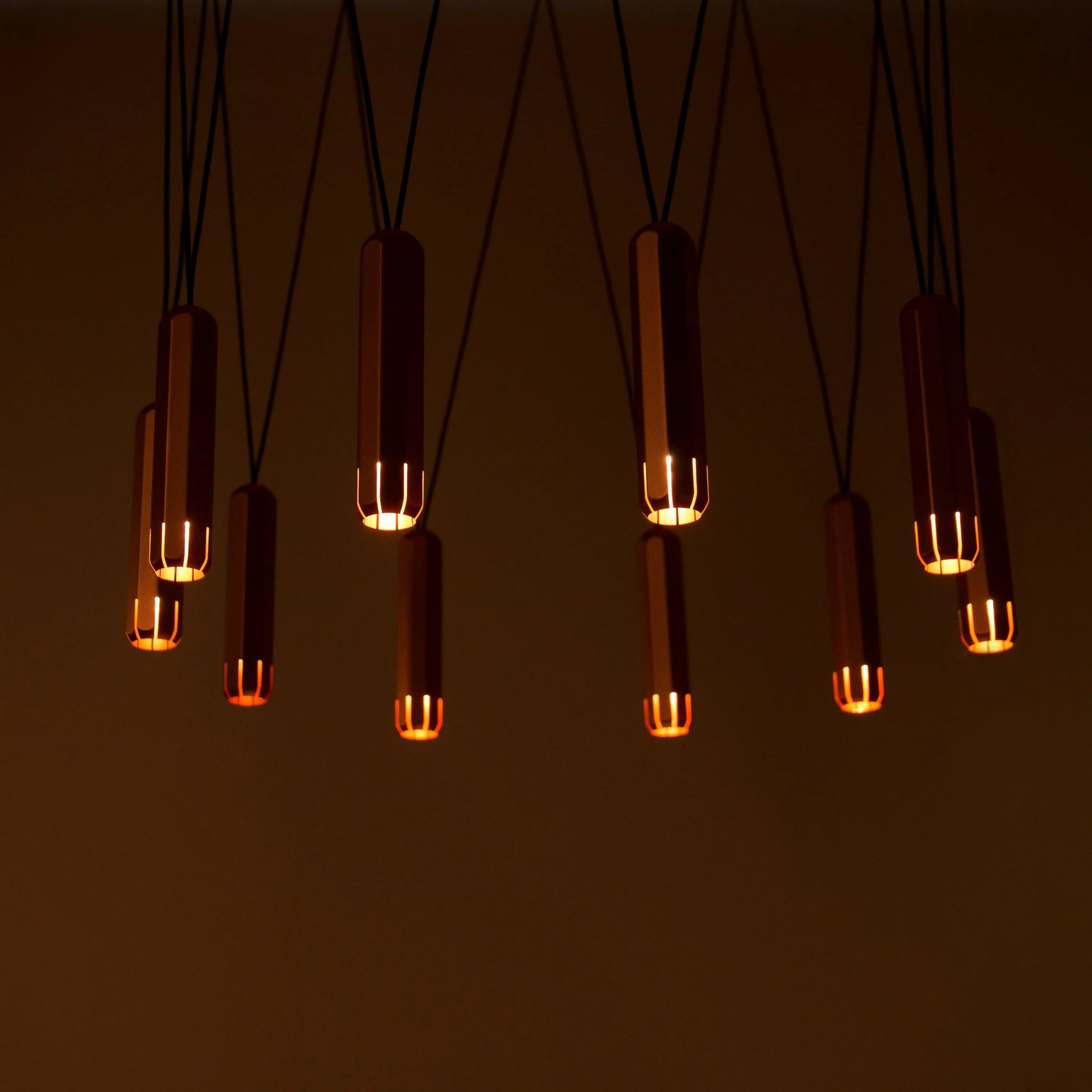 Copper finish Innermost Brixton Cluster pendant light with 10 LED spots in modern living room