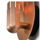 Close-up of Innermost Brixton WB108305 in copper, showcasing octagonal design and integrated LED light source.