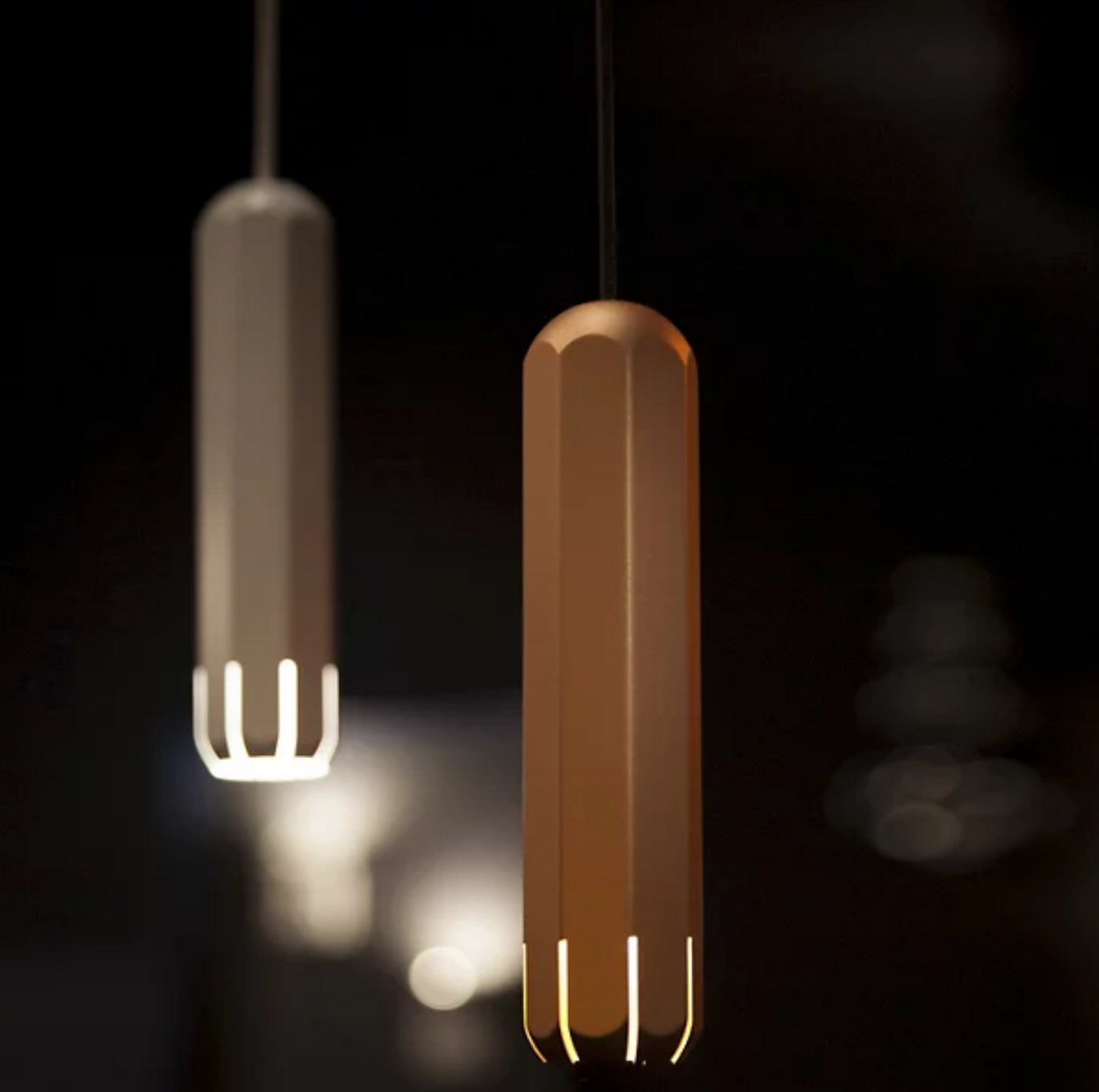 Detail of Brixton copper finish showcasing the octagonal turret design and white matt PVC cable for modern interiors.