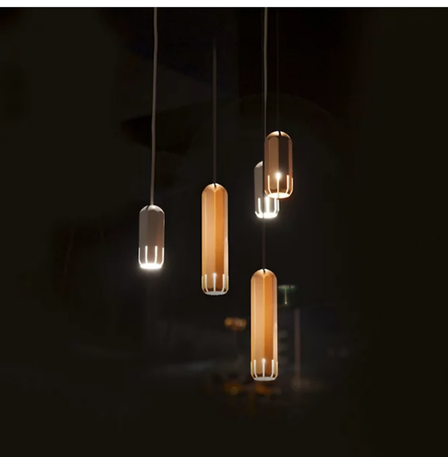 Industrial style Innermost Brixton dimmable LED fixture (5W 120V), providing focused light for a reading nook.