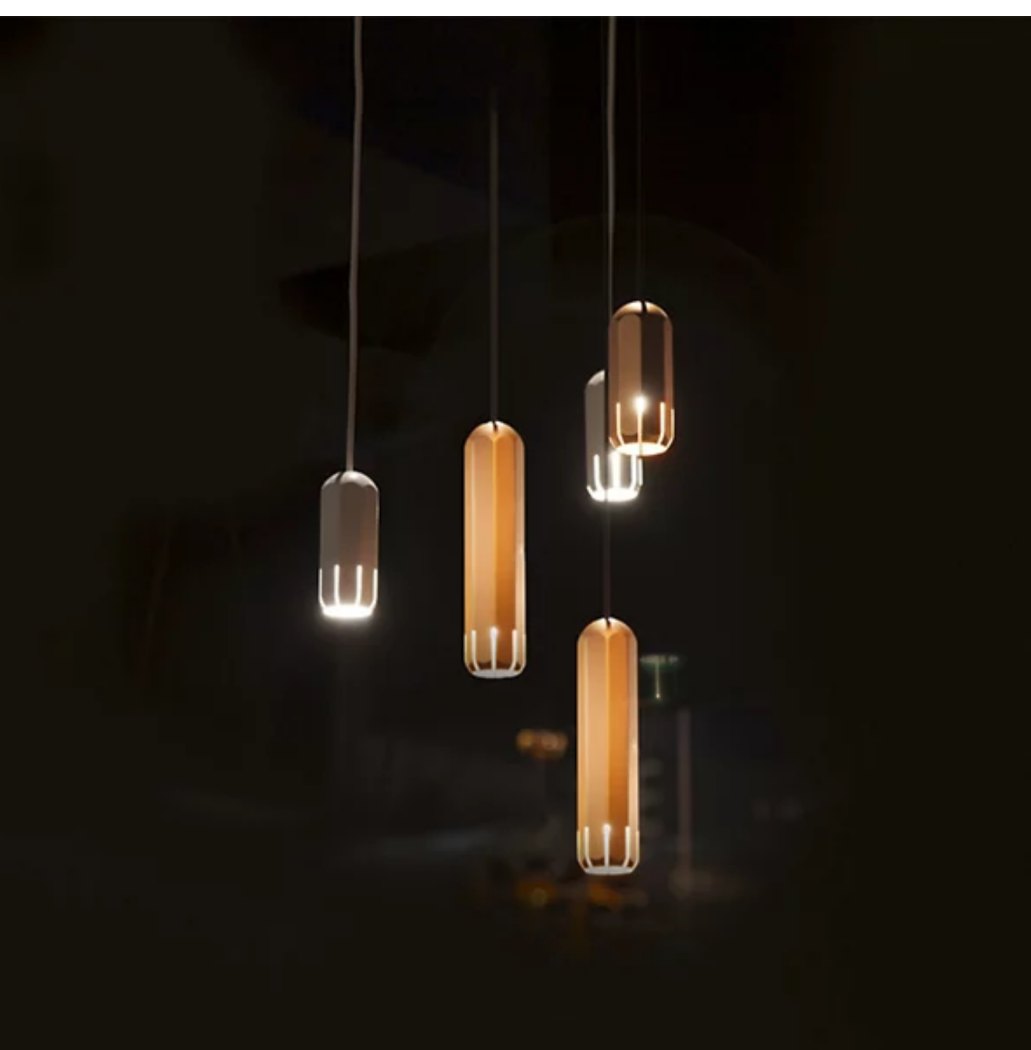 Industrial style Innermost Brixton dimmable LED fixture (5W 120V), providing focused light for a reading nook.