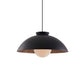Black Chelsea teacup pendant lamp in a modern living room with soft gold interior reflection