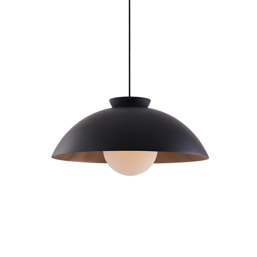 Black Chelsea teacup pendant lamp in a modern living room with soft gold interior reflection