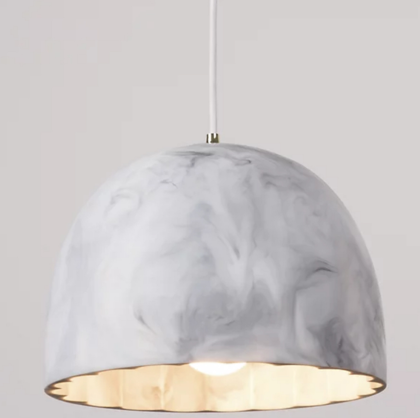 Doric 28 LED lamp providing diffused lighting, perfect for a contemporary home interior.
