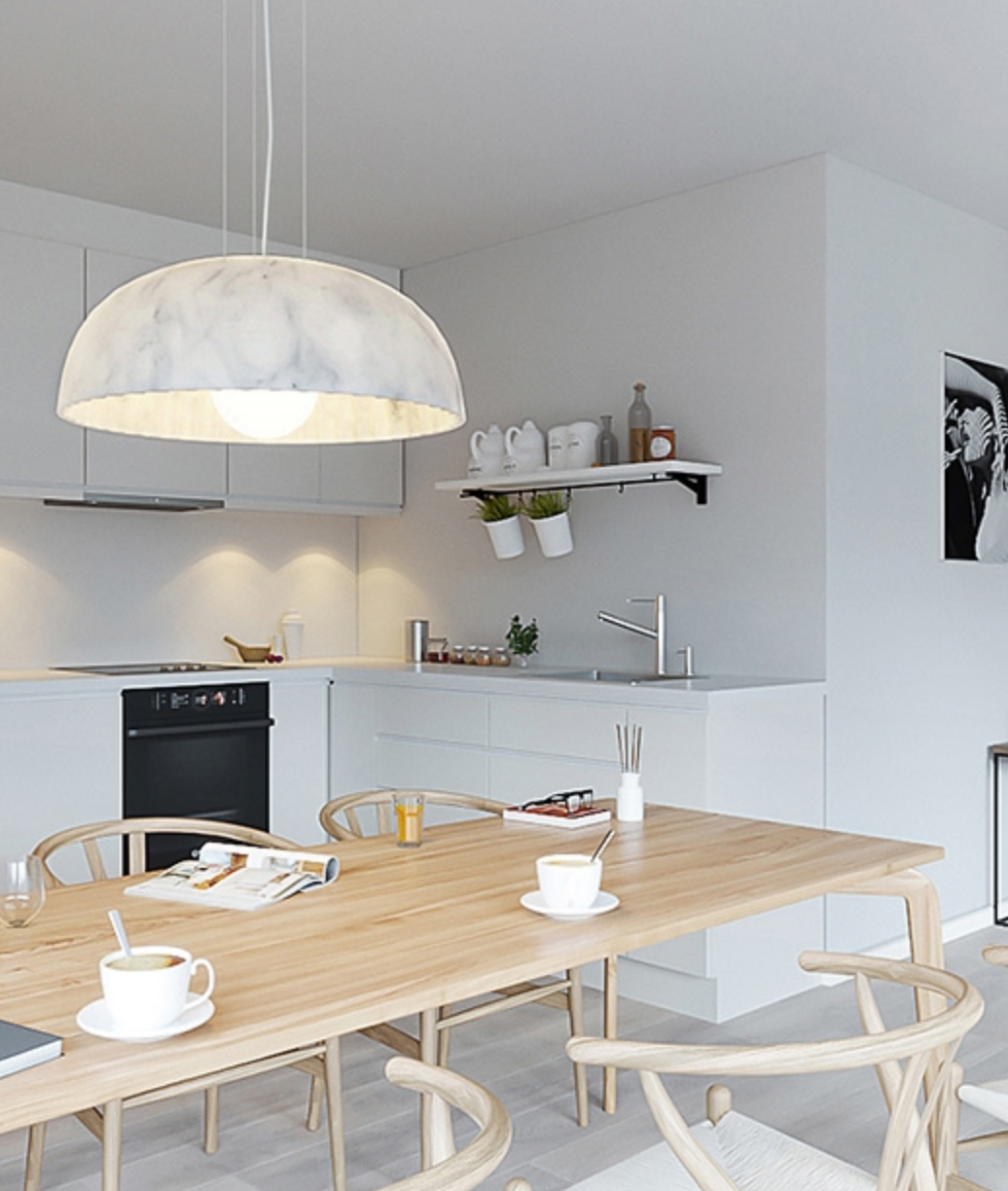 Doric 60 LED pendant light in Marble White, demonstrating its elegant form and clean aesthetic for minimalist interiors.