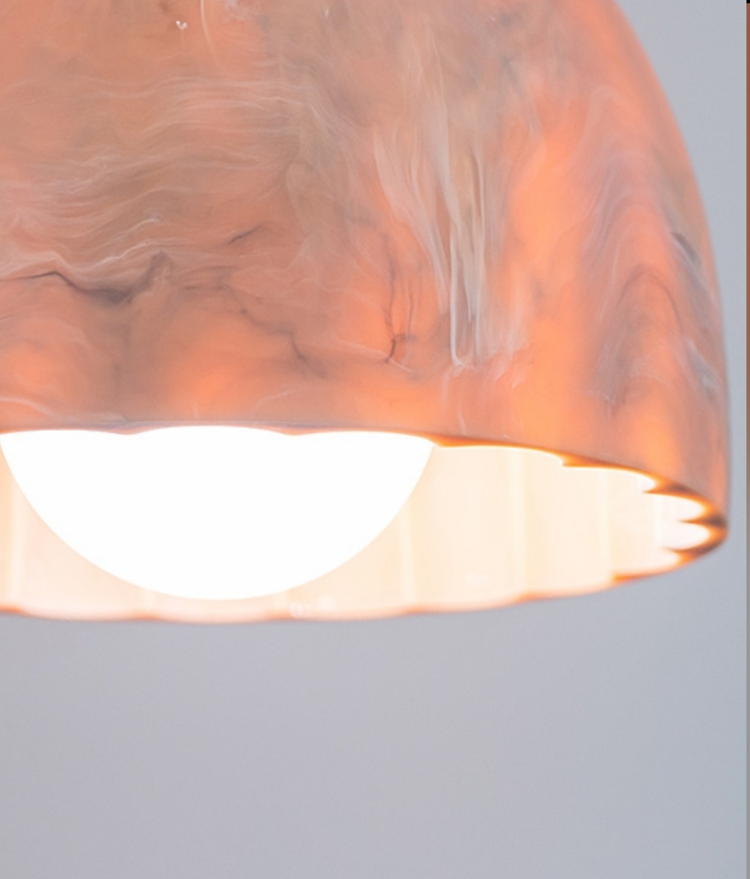Contemporary resin pendant light, the Doric 60, providing efficient LED illumination with a long 15,000-hour lifespan.
