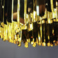 High-End Tom Kirk 24-Inch Chandelier with Polished Faceted Metal Design