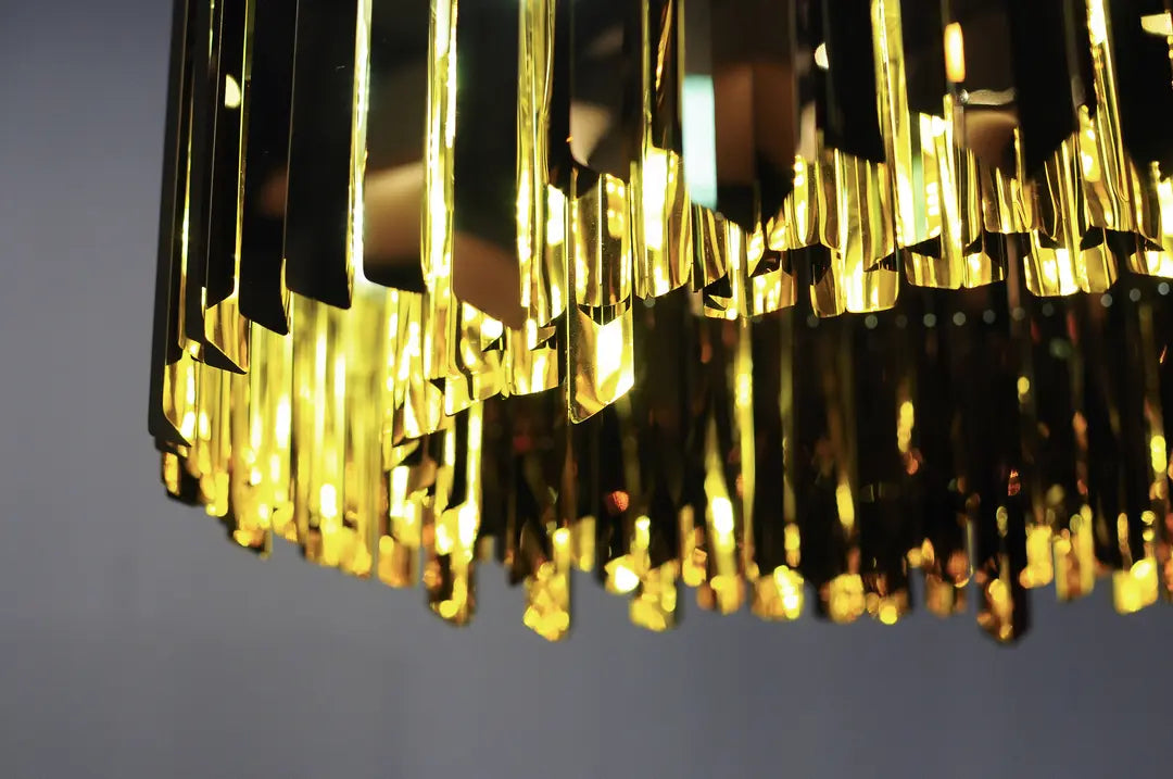 High-End Tom Kirk 24-Inch Chandelier with Polished Faceted Metal Design