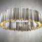 Innermost Facet 100 stainless steel chandelier in modern living room in stainless steel