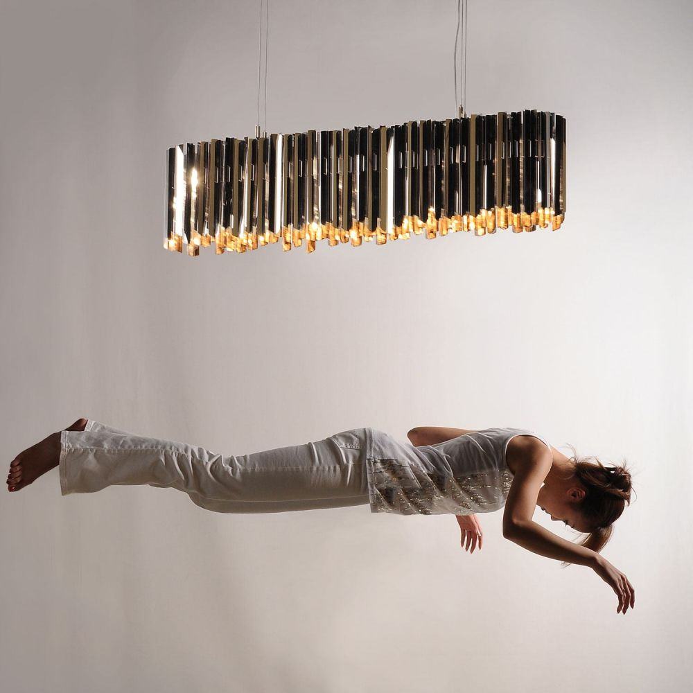 Dimmable bronze ceiling fixture ideal for contemporary dining rooms.