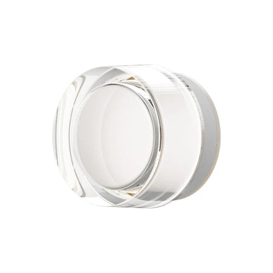 Sleek modern LED flush mount light fixture for low ceiling living room residential use.