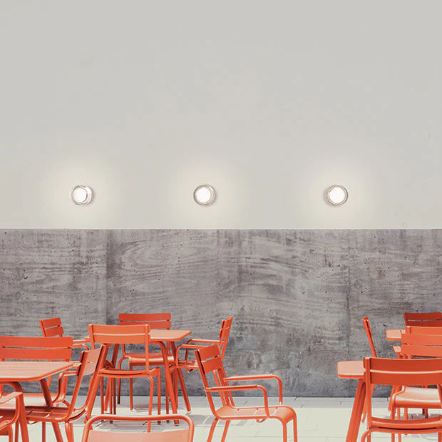 Energy-efficient round flush mount ceiling light with adjustable CCT for smart home residential.