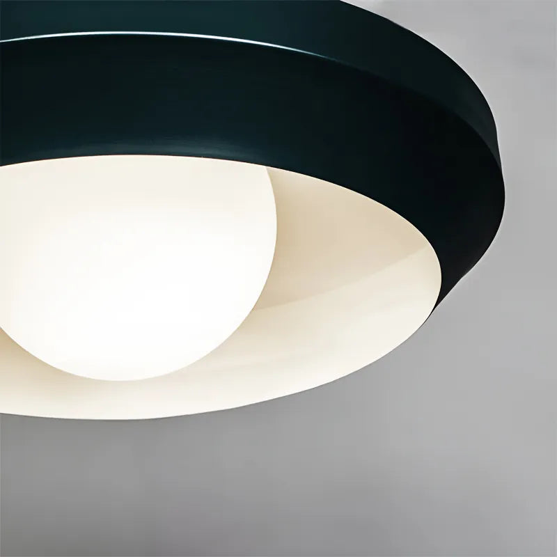 Black nnermost Hoxton light fixture above dining table