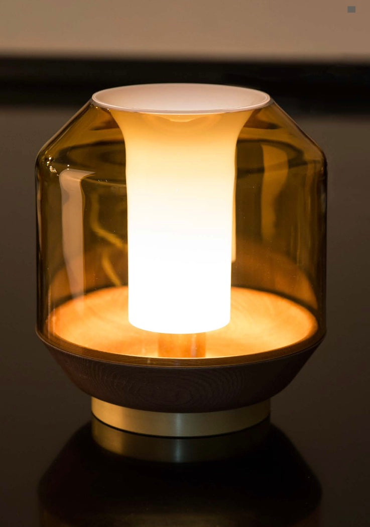 Contemporary table lamp for hotel rooms with warm LED glow