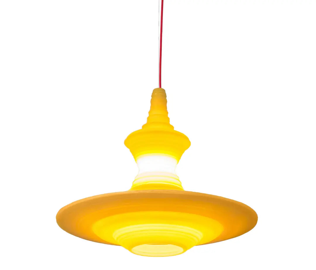 Stupa 56 Yellow Pendant Light in a hotel lobby setting, showcasing architectural inspired design and luxurious illumination.