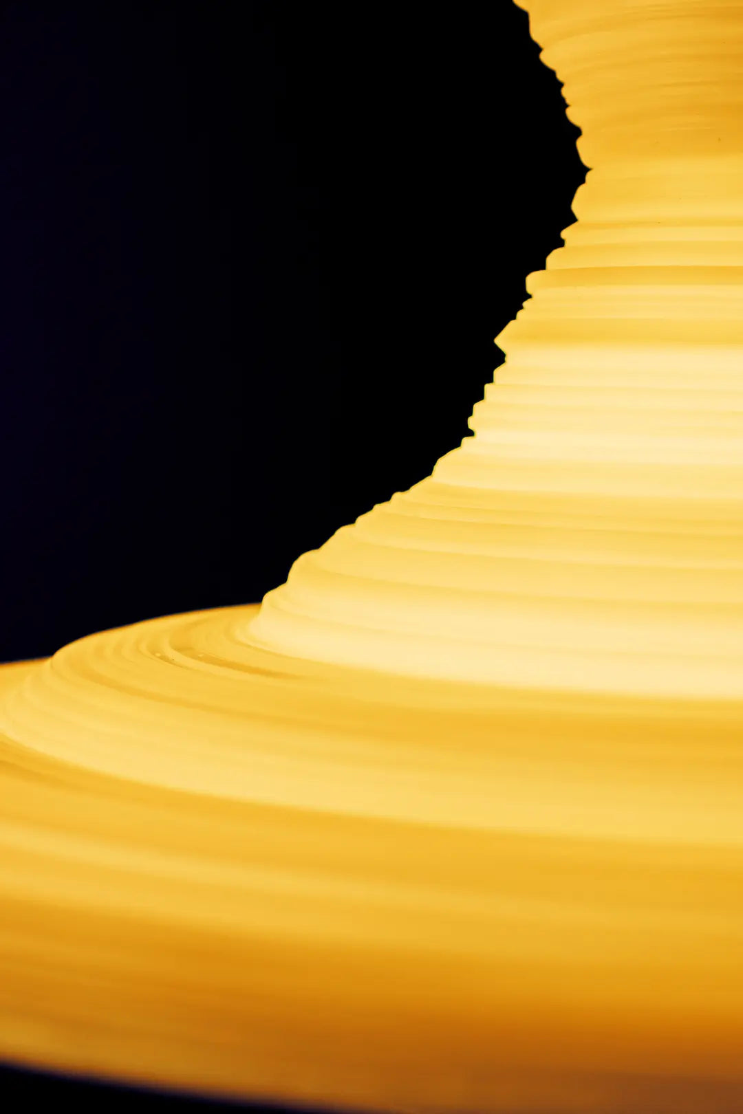 Yellow Stupa Pendant Light with red braided cable, showcasing color options and design details.