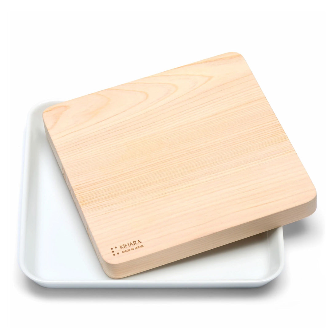 Kihara Sitaku Hinoki Cutting Board with Porcelain Plate – hinoki board resting on the white porcelain plate