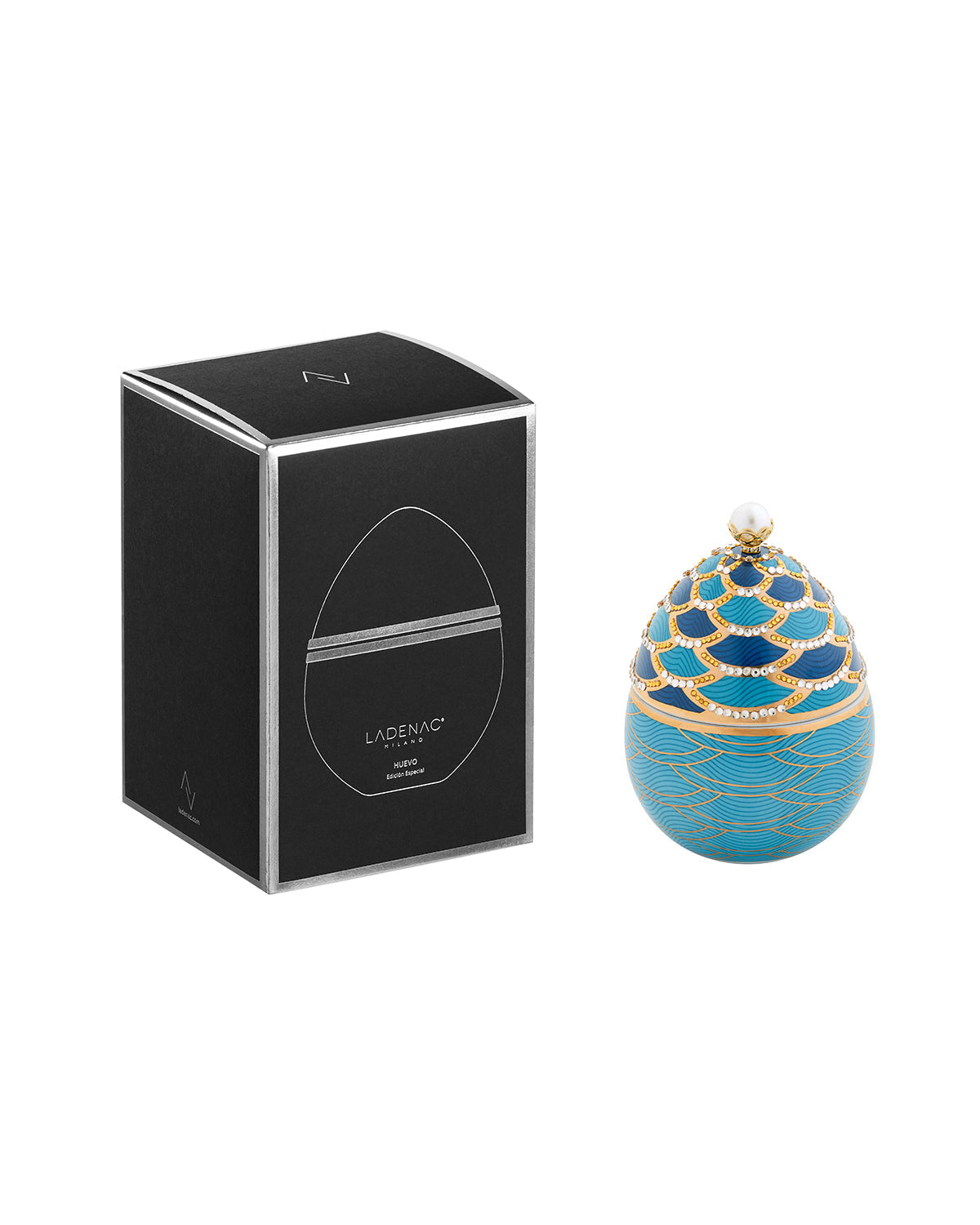 Bois de Russie 220 g ceramic egg candle by Ladenac Milano, Scales egg beside its black gift box