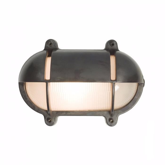Oval Bulkhead with Eyelid Shield, Weathered Brass by Original BTC (photo 1)